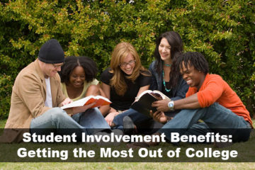 college student involvement - students sitting on lawn and discussing